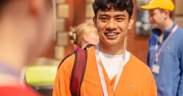 Student in the Atrium of Hartlepool Sixth Form College.