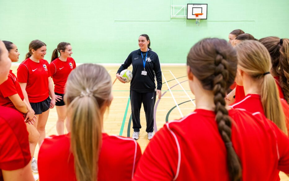 Hartlepool Sixth Form College sport students taking part in a team talk before a netball session.